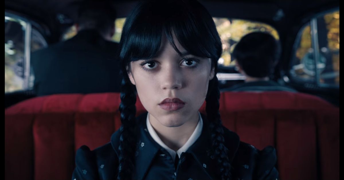 Wednesday Addams driving to Nevermore Academy with her parents