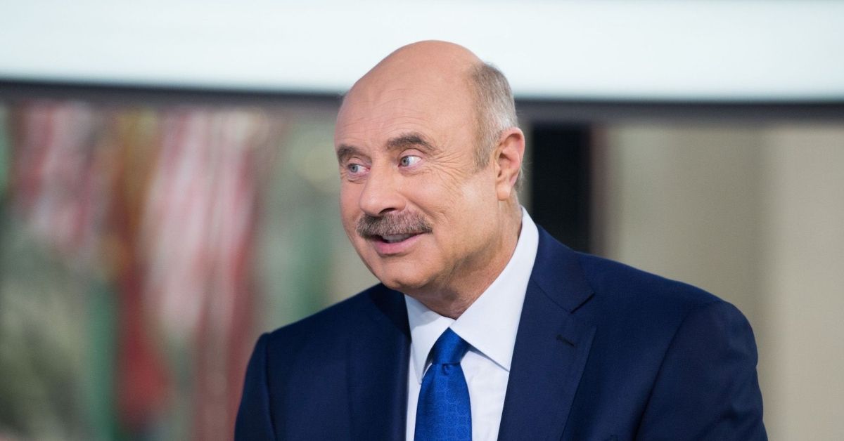 Dr. Phil wears a suit and talks about Dr. Phil