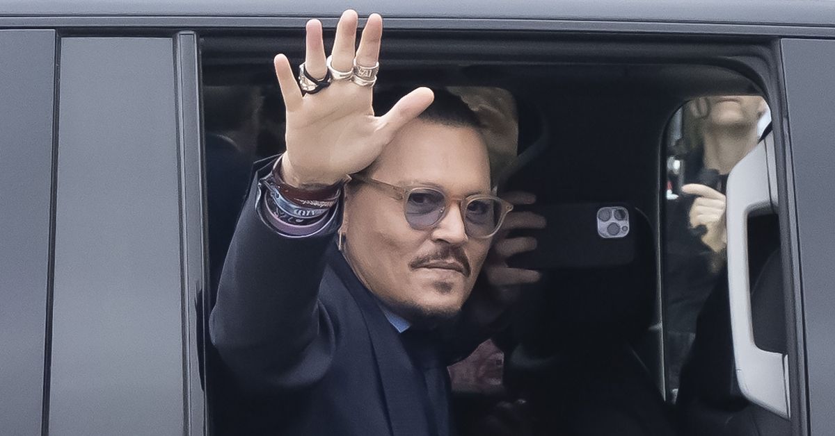 Johnny Depp waves to fans 