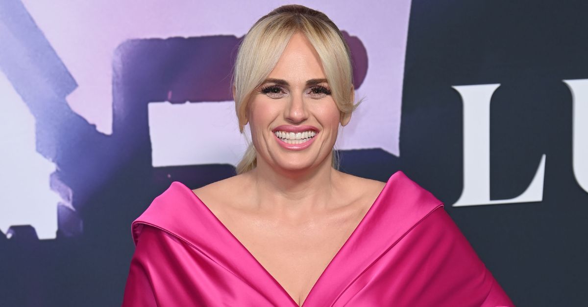 Rebel Wilson wearing a pink dress at an event