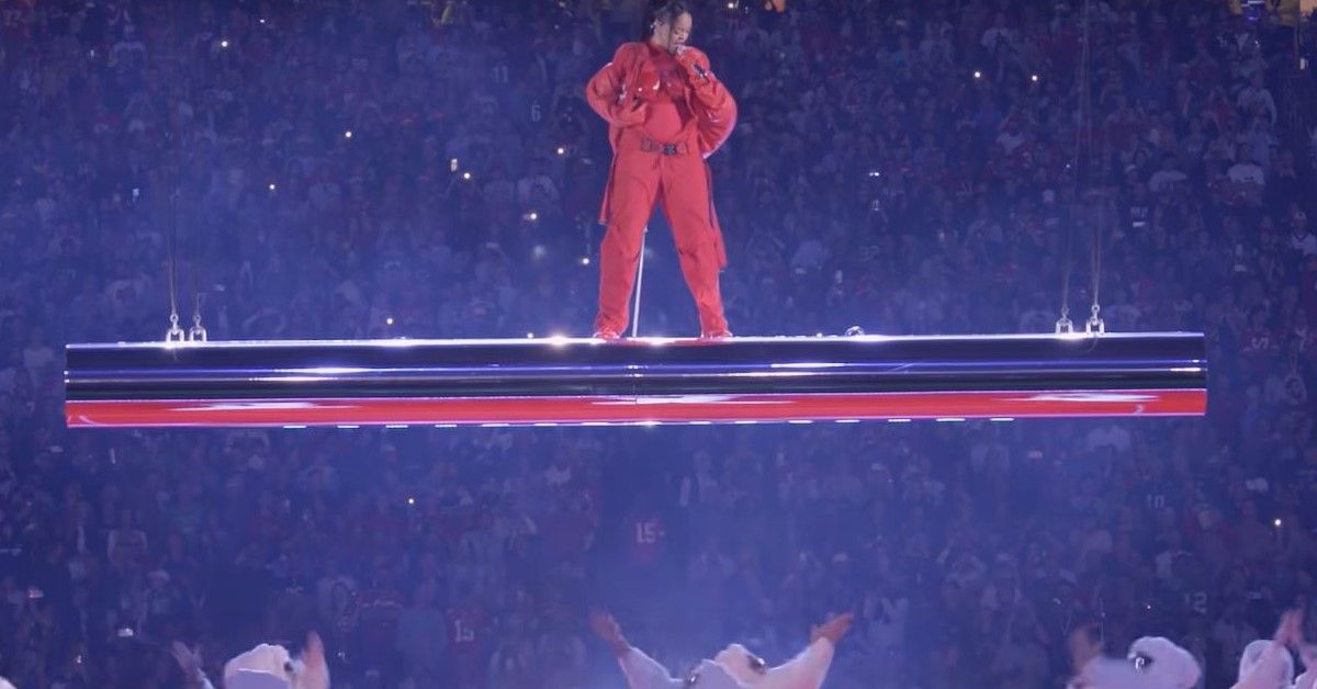 Rihanna performs on a suspended platform during the Super Bowl halftime show. 