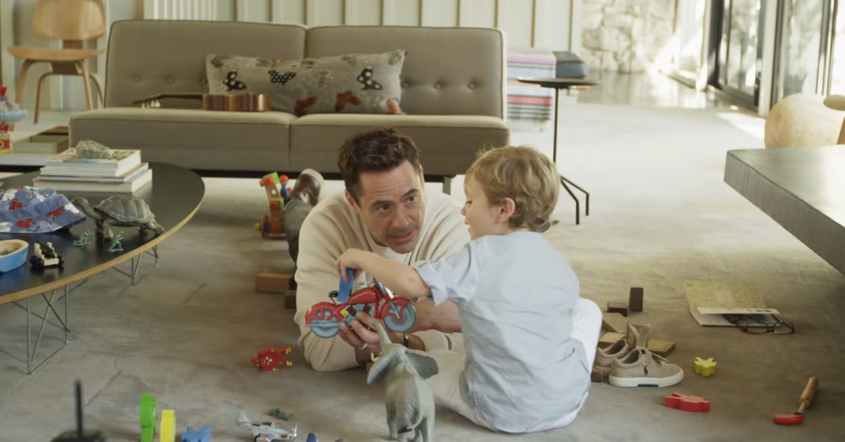Robert Downey Jr playing with his son.