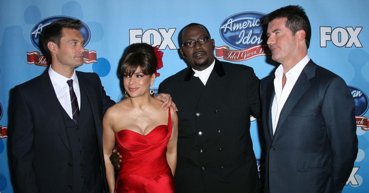 Simon Cowell, Paula Abdul, Randy Jackson, and Ryan Seacrest on the red carpet