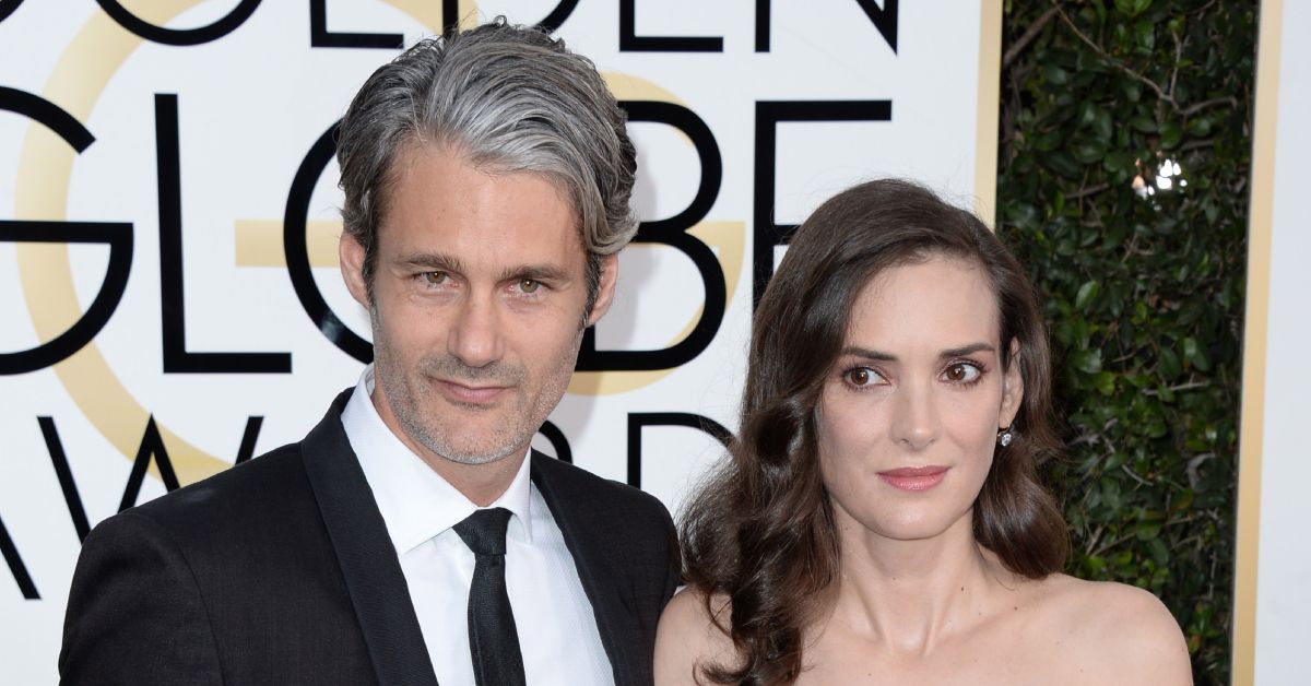 Winona Ryder and Scott Mackinlay Hahn side by side at the Golden Globes
