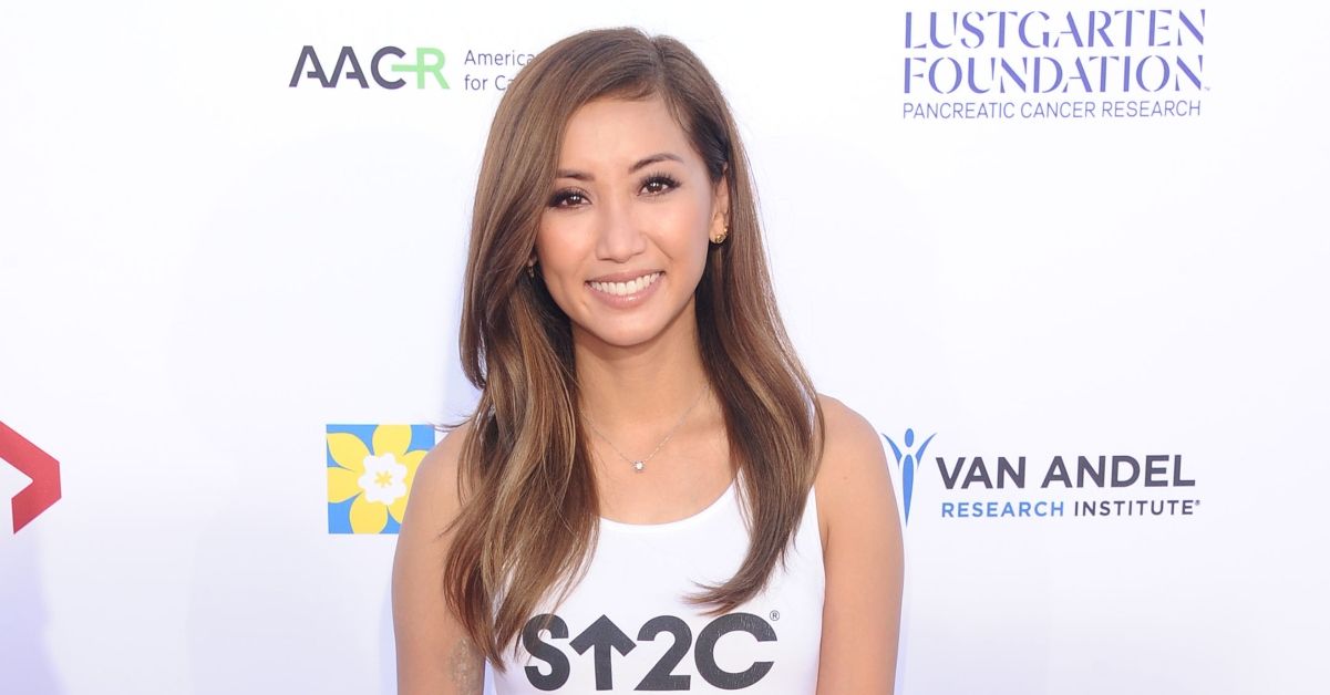 brenda song on a red carpet at a cancer benefit