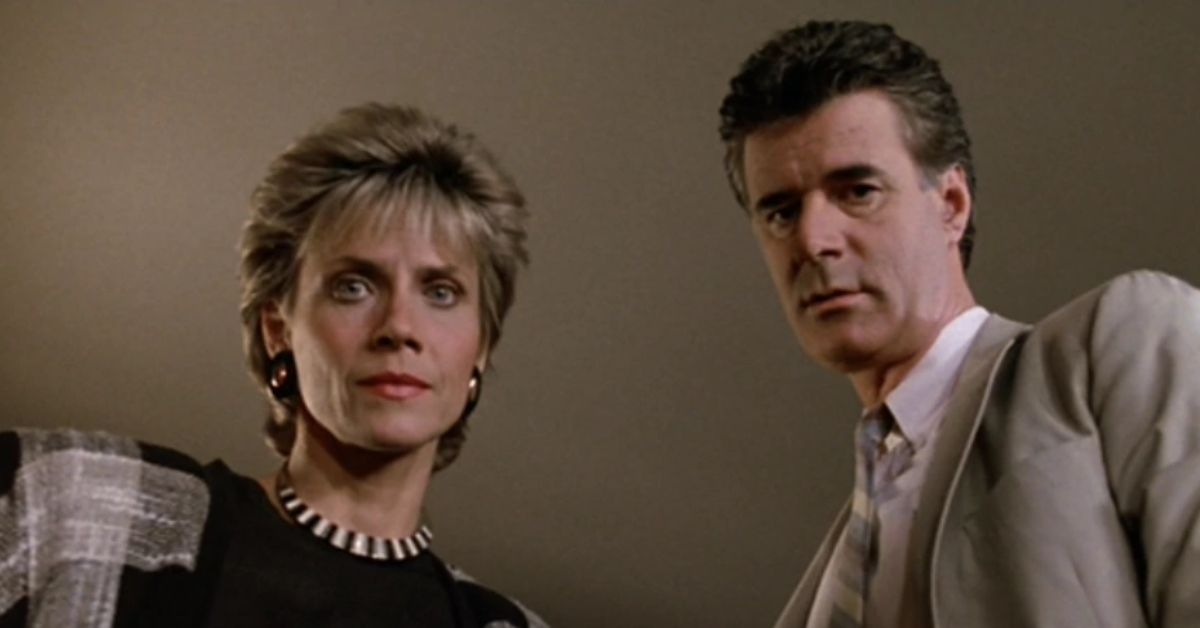 Katie and Tom Bueller looking serious in Ferris Bueller's Day Off