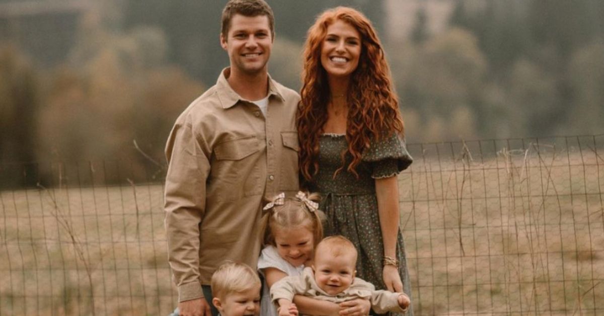 Jeremy, Audrey, Bode, Ember and Radley Roloff smiling and standing in a field