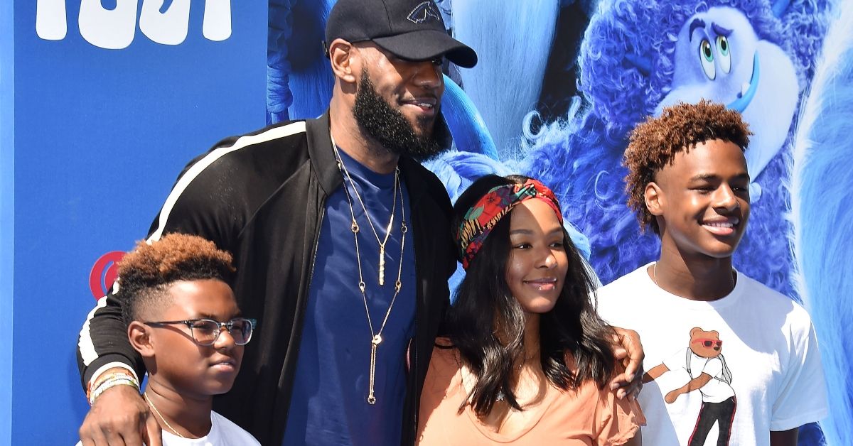 LeBron James and his wife and two sons 