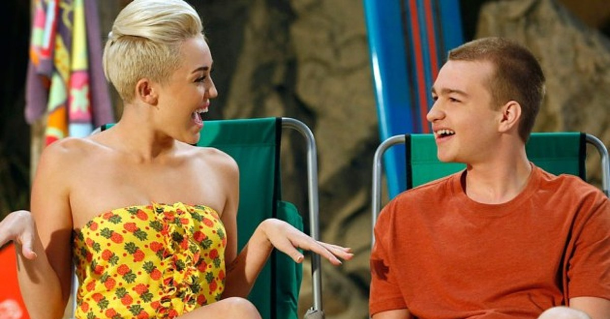 Miley Cyrus called her experience alongside Angus T. Jones in Two and a Half Men “strange.”