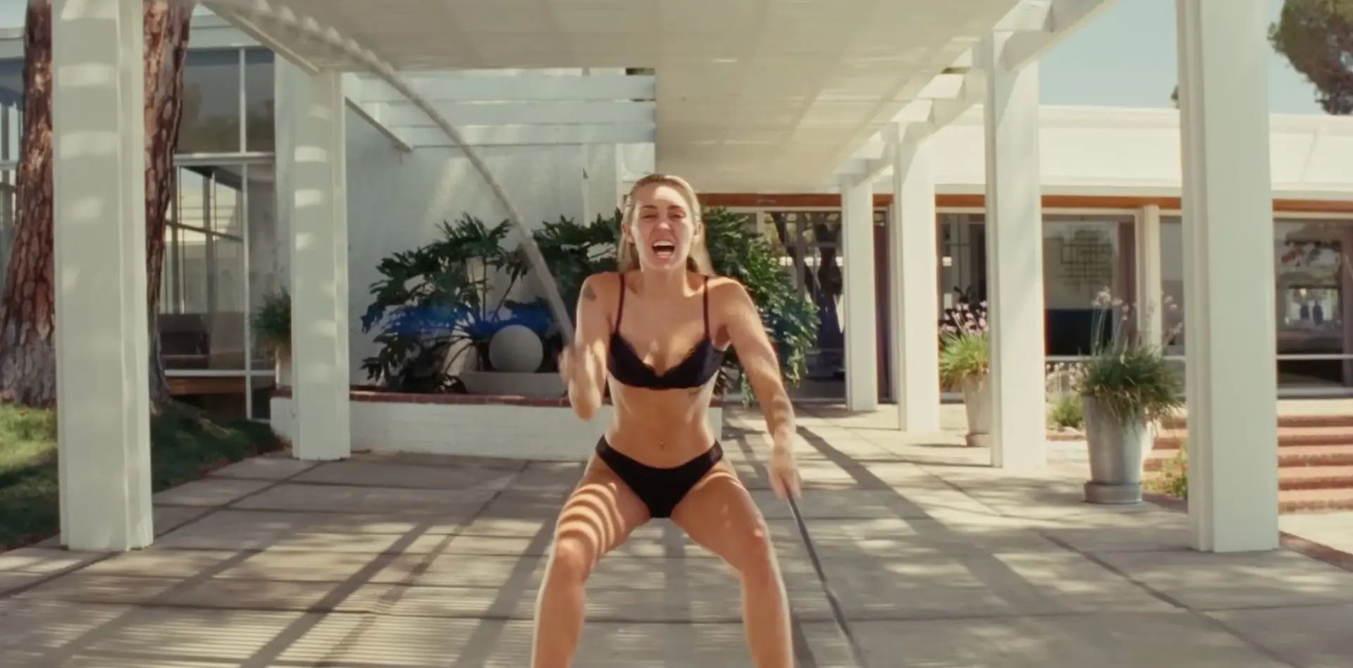 Miley Cyrus 'Flowers' workout in black lingerie