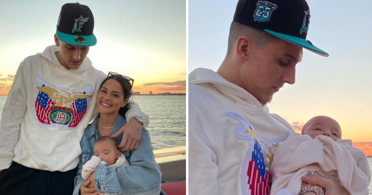 Katya Henry and Tyler Herro with their first child