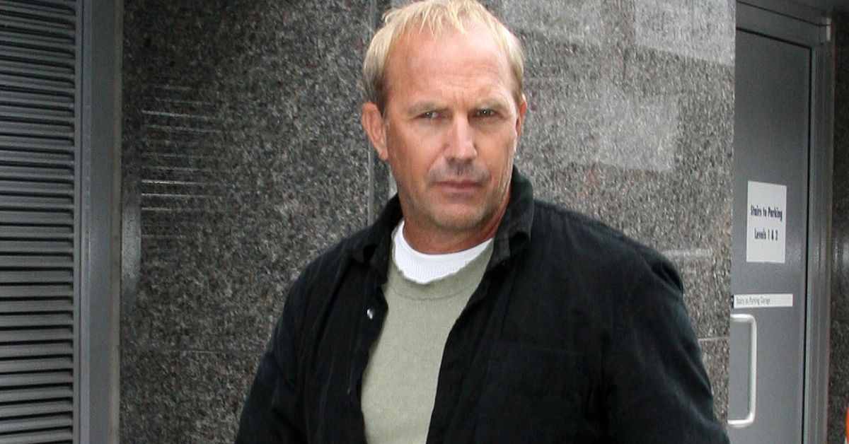 Kevin Costner looking serious out for a walk