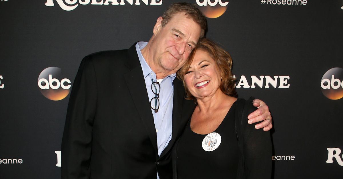 Roseanne Barr and John Goodman embracing