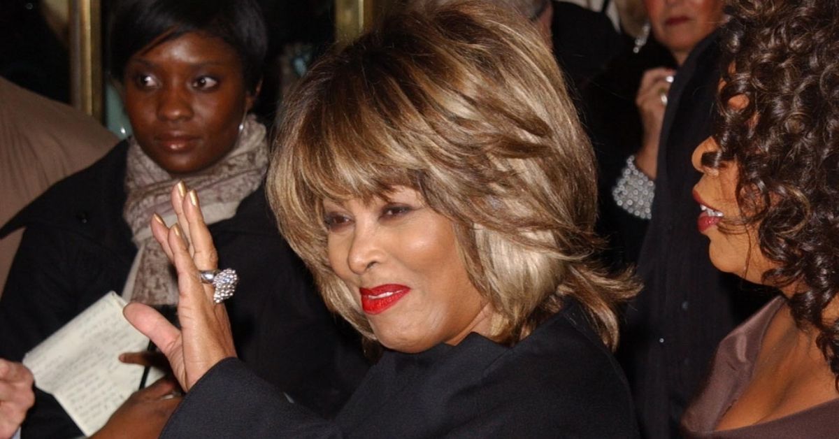 Tina Turner looking like she is waving goodbye