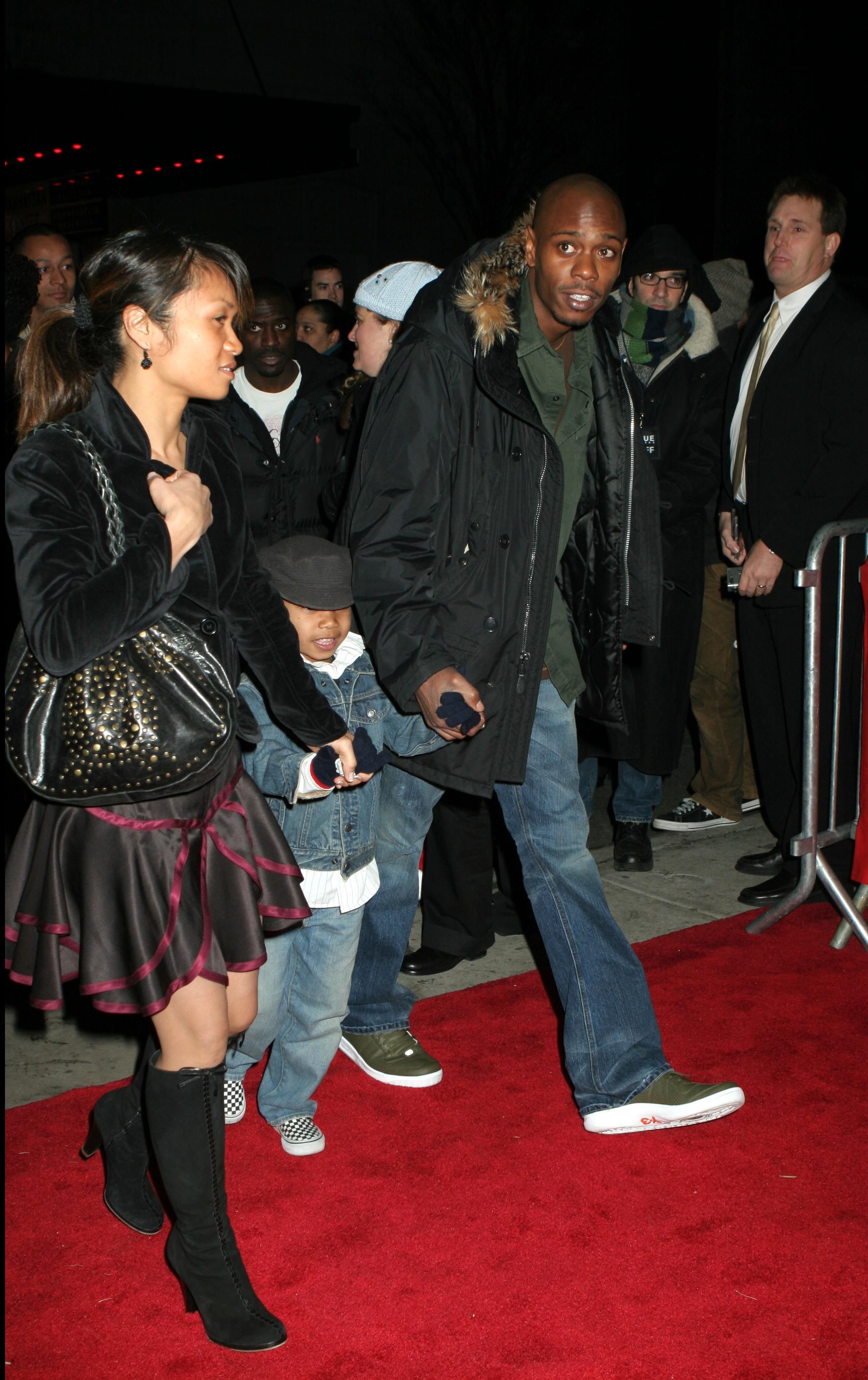Dave Chappelle, wife Elaine, and daughter at movie premiere