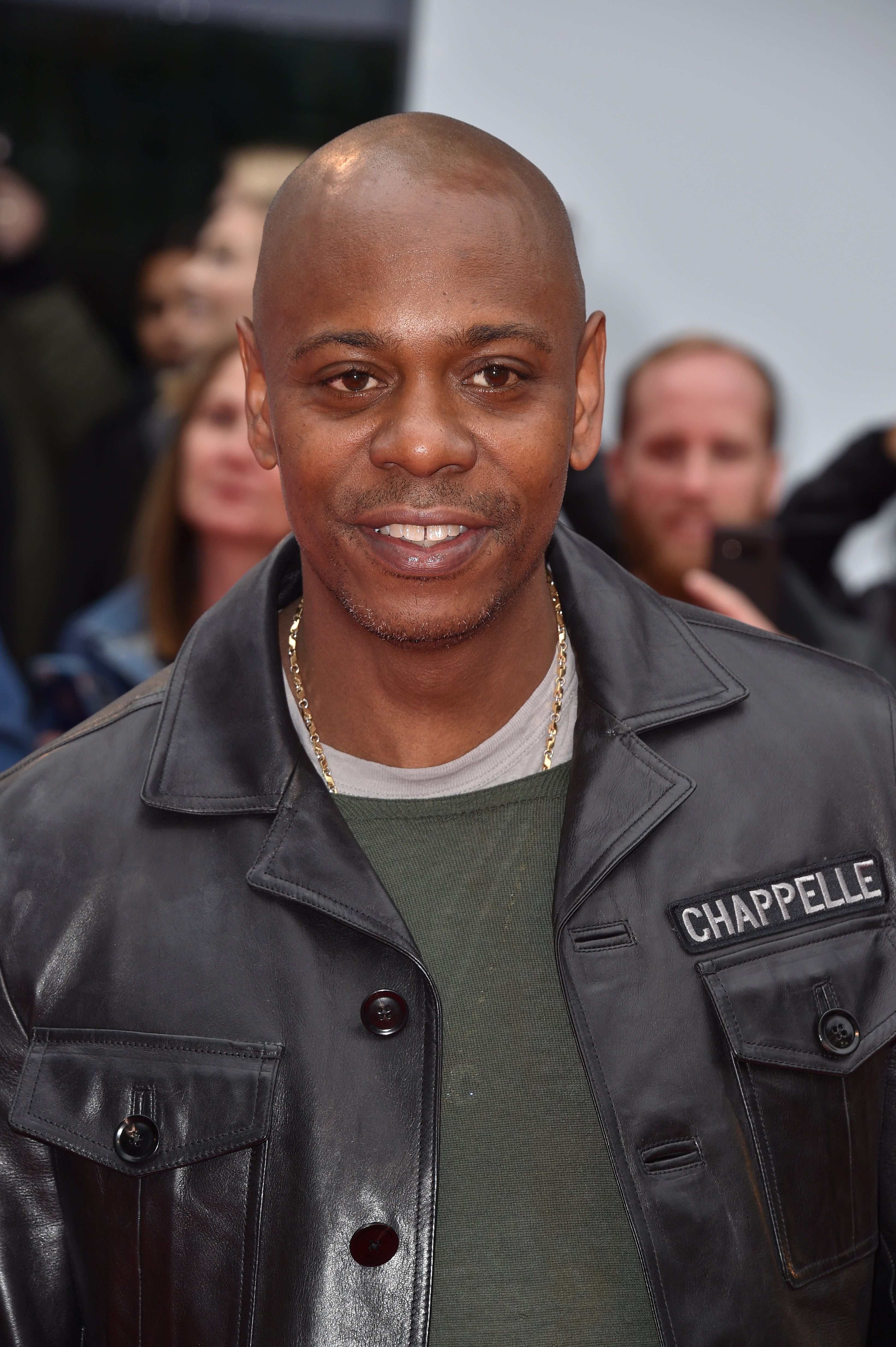 a closeup of Dave Chappelle