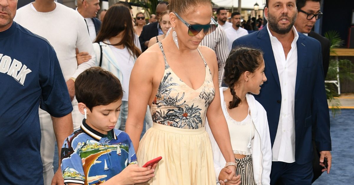Jennifer Lopez, Maximilian David Muniz and Emme Muniz walking outside