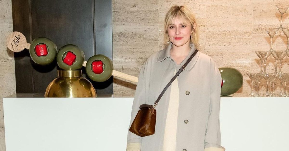 Gracie McGraw in a coat