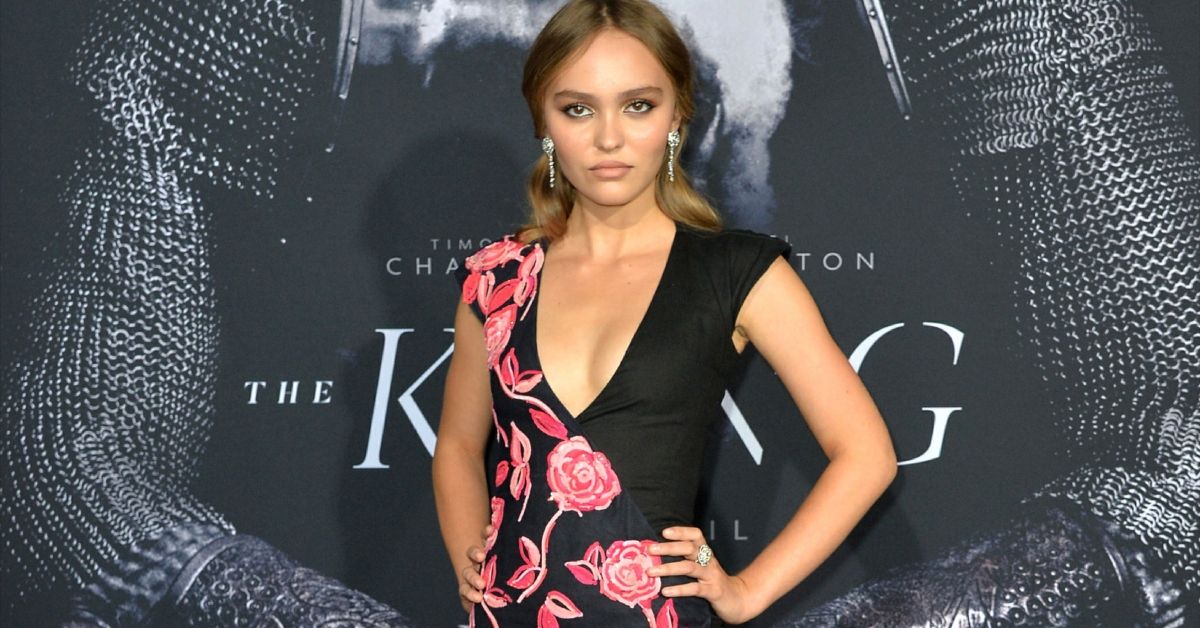 Lily-Rose Depp posing for a photo at an event
