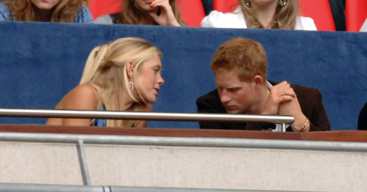 Prince Harry and Chelsy Davy having a private moment at Wembley Stadium
