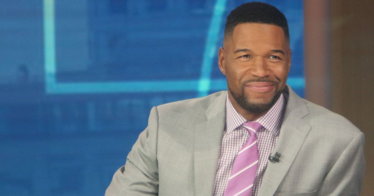 Photo of Michael Strahan in grey suit on GMA