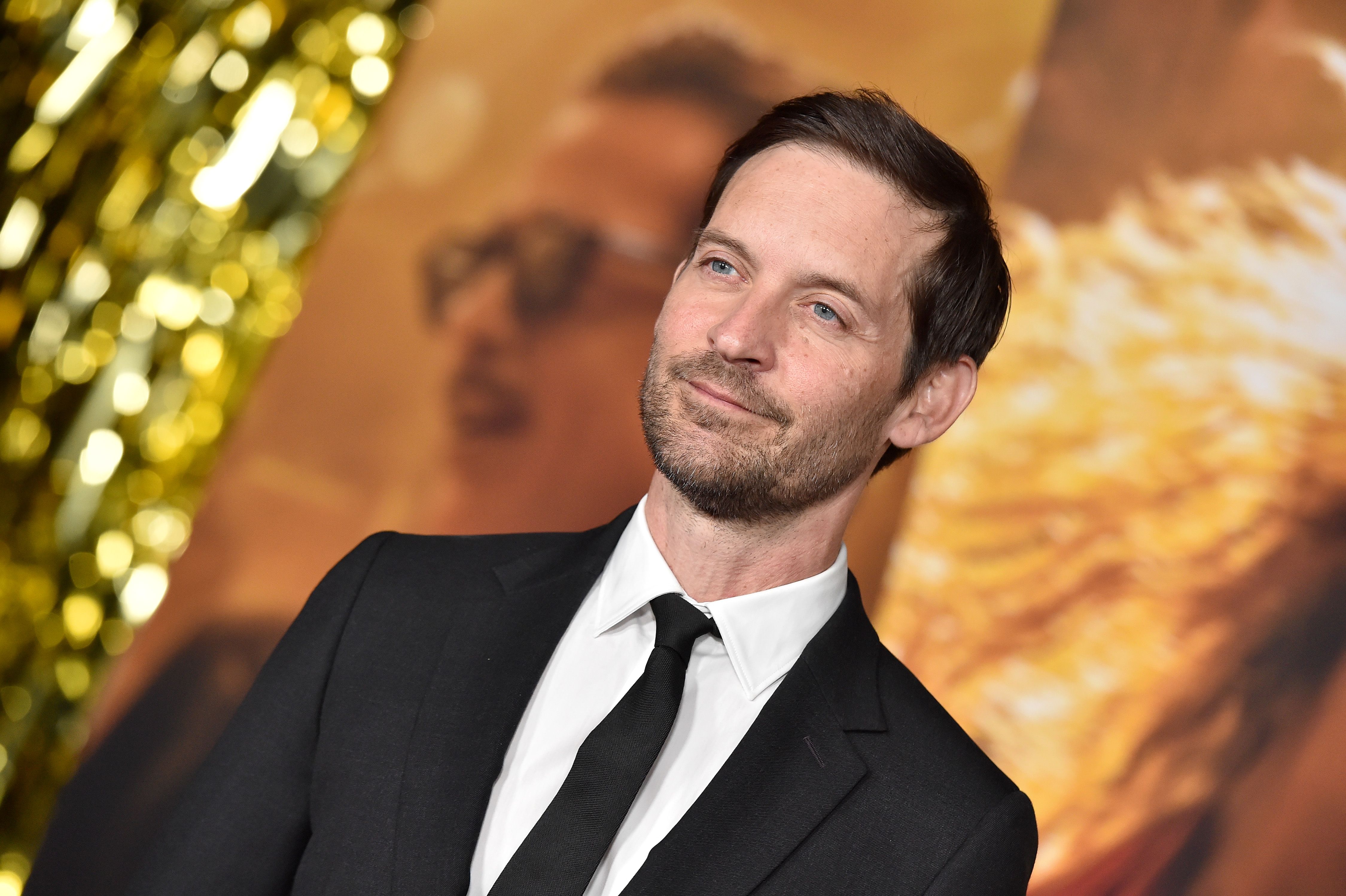 Tobey Maguire in suit at Babylon premiere