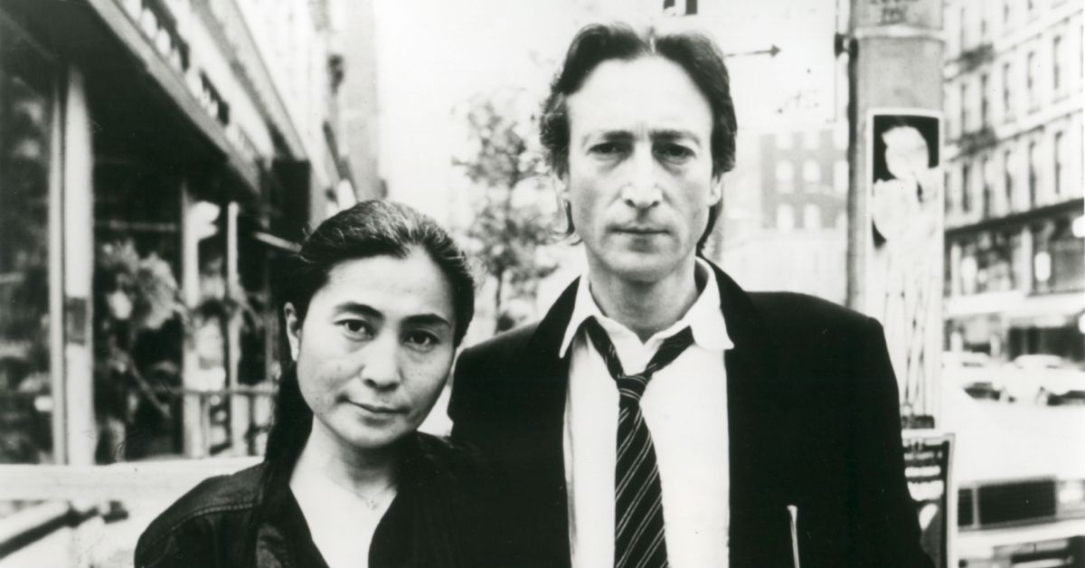John Lennon and Yoko Ono on a city street