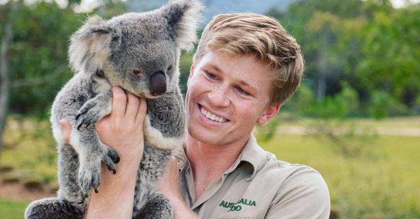 Robert Irwin and a koala