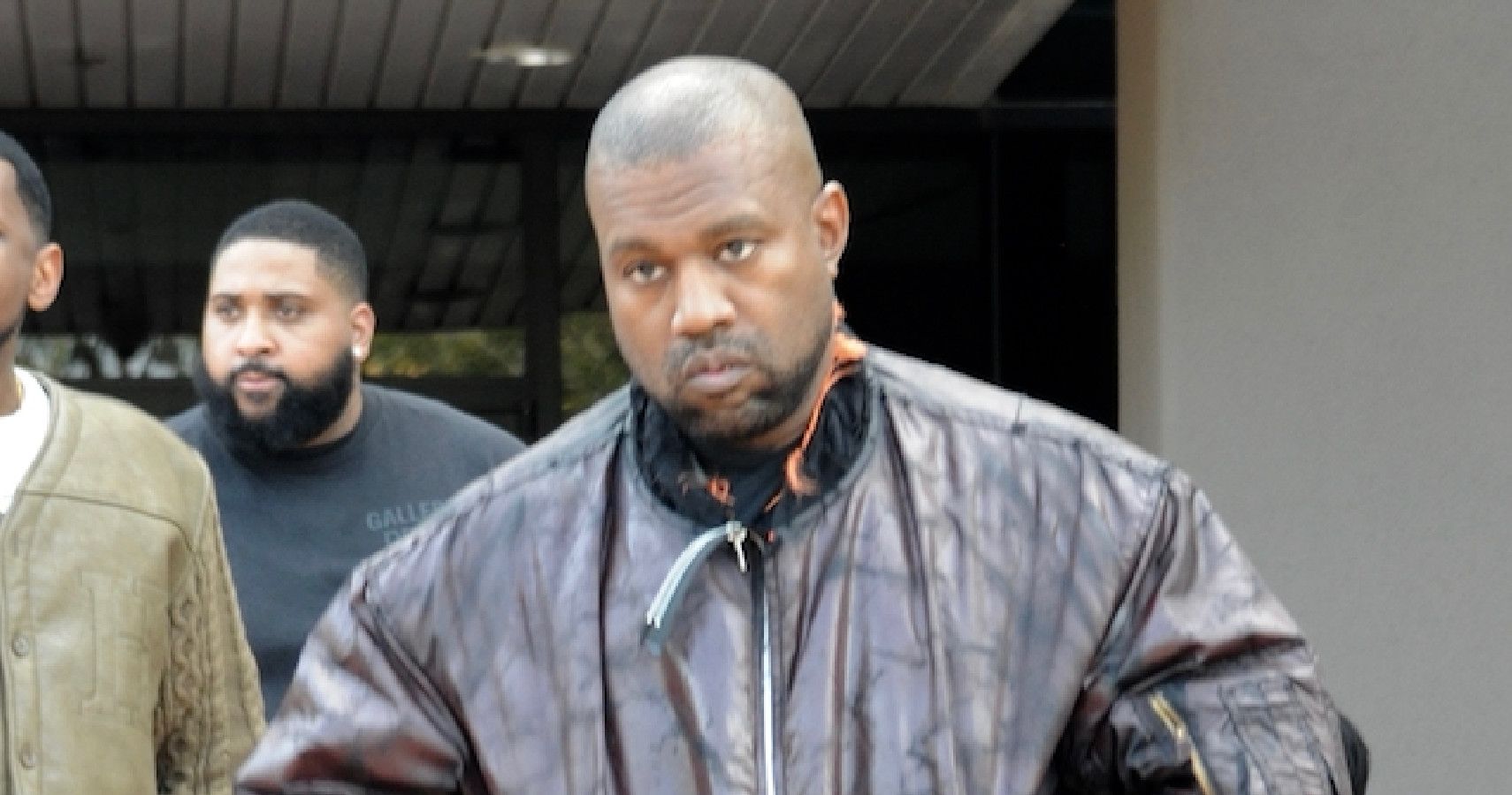 Kanye West in a bomber jacket 