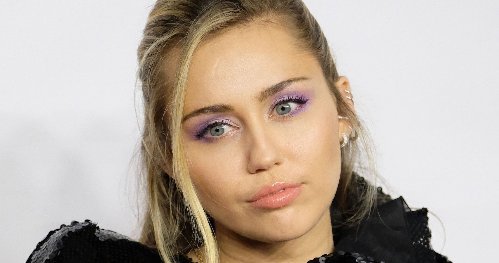 Miley Cyrus wearing black 