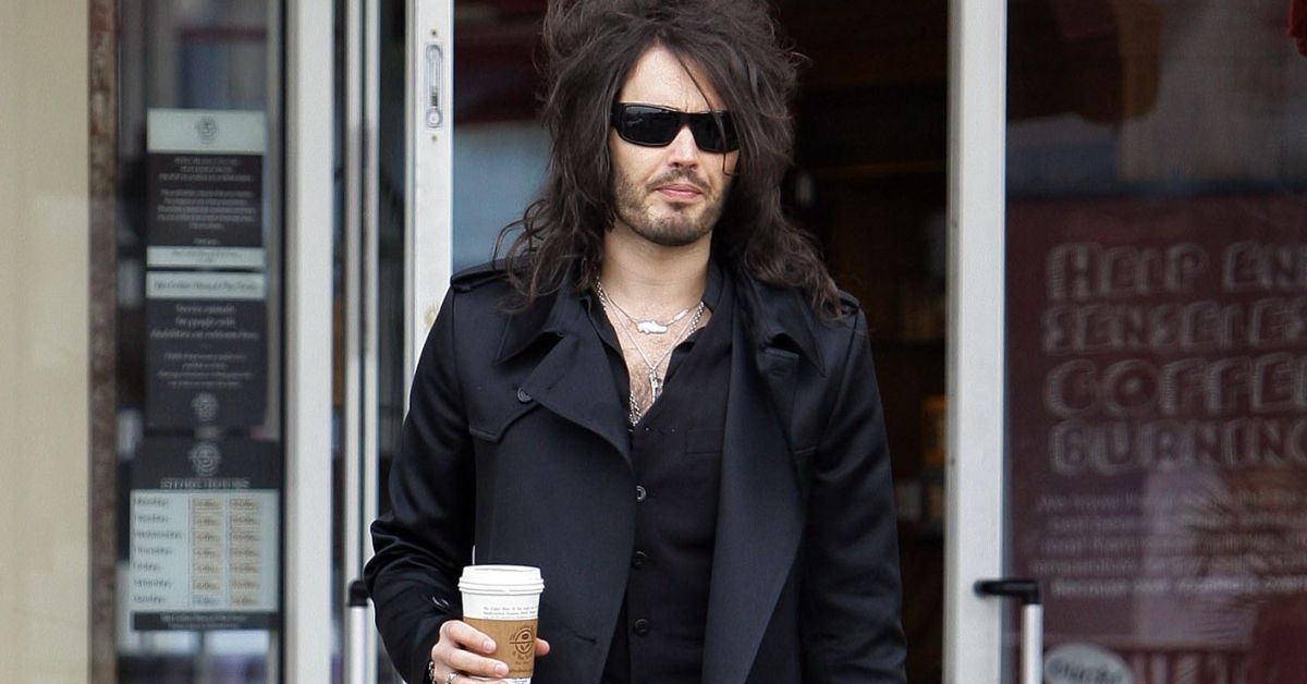 Russell Brand walking outside of The Coffee Bean