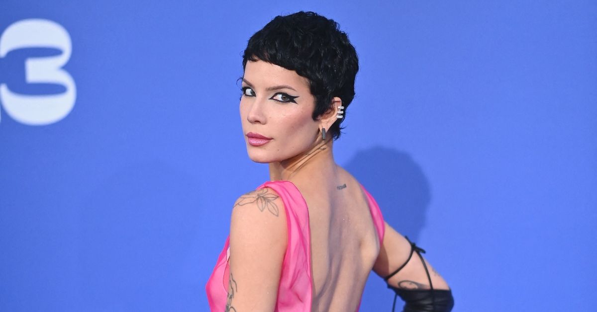 Halsey poses for photos at event