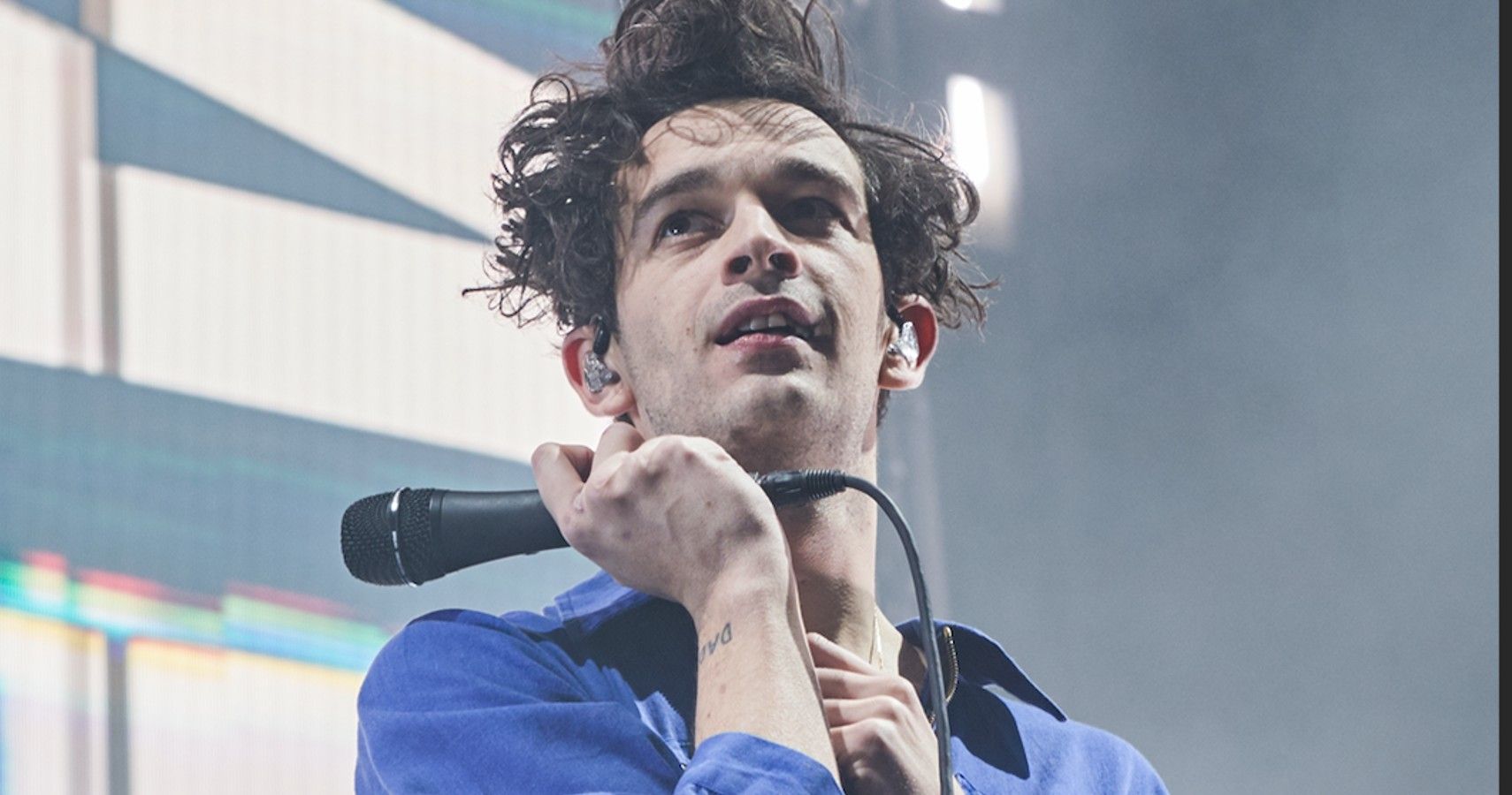 Matty Healy performing with the 1975 