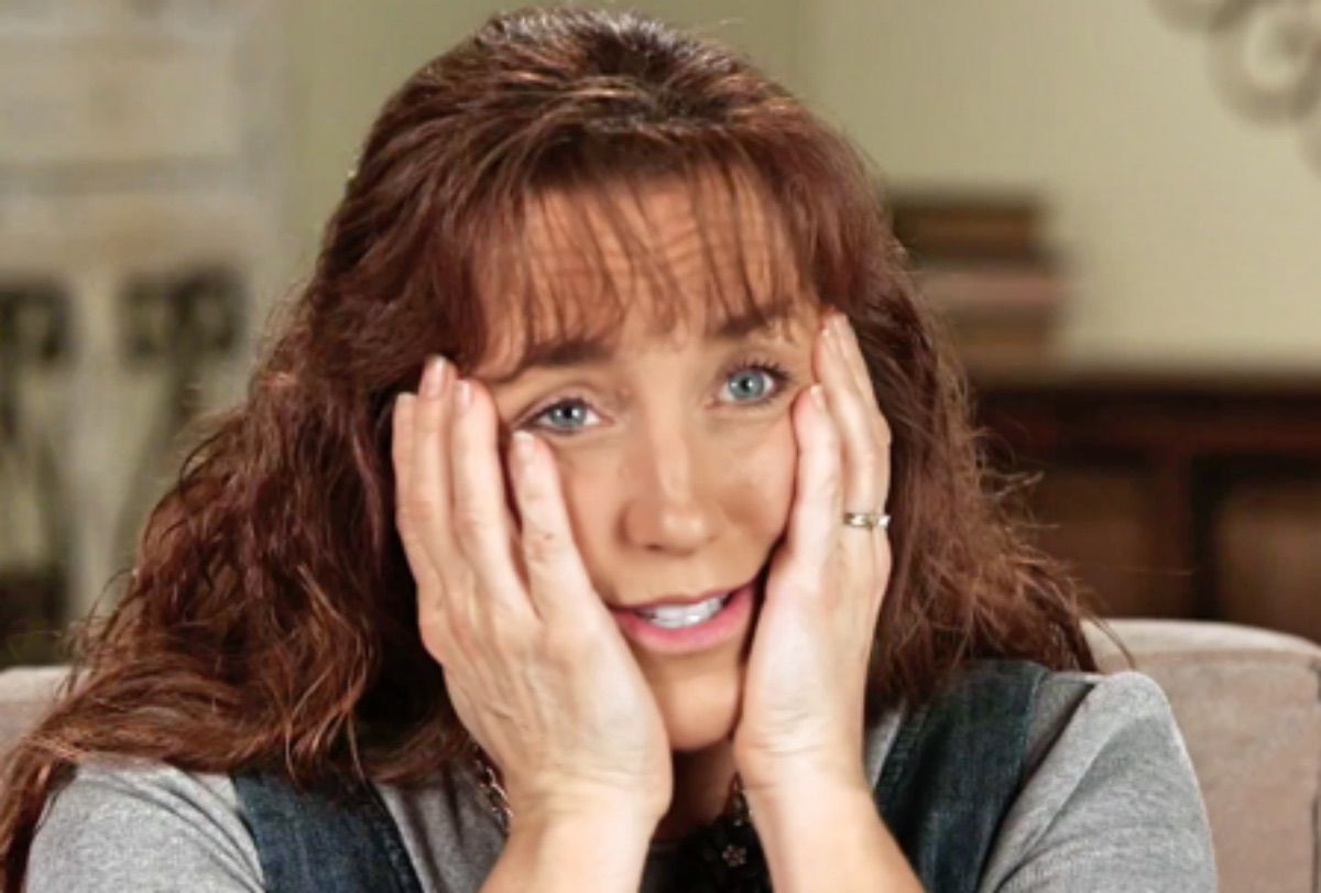Michelle Duggar with her hands on her face TLC