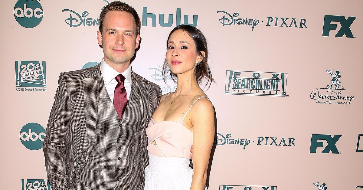 Patrick J. Adams and wife Troian Bellisario 