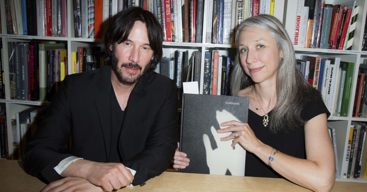 Keanu Reeves and Alexandra Grant at a book signing for their book Shadows
