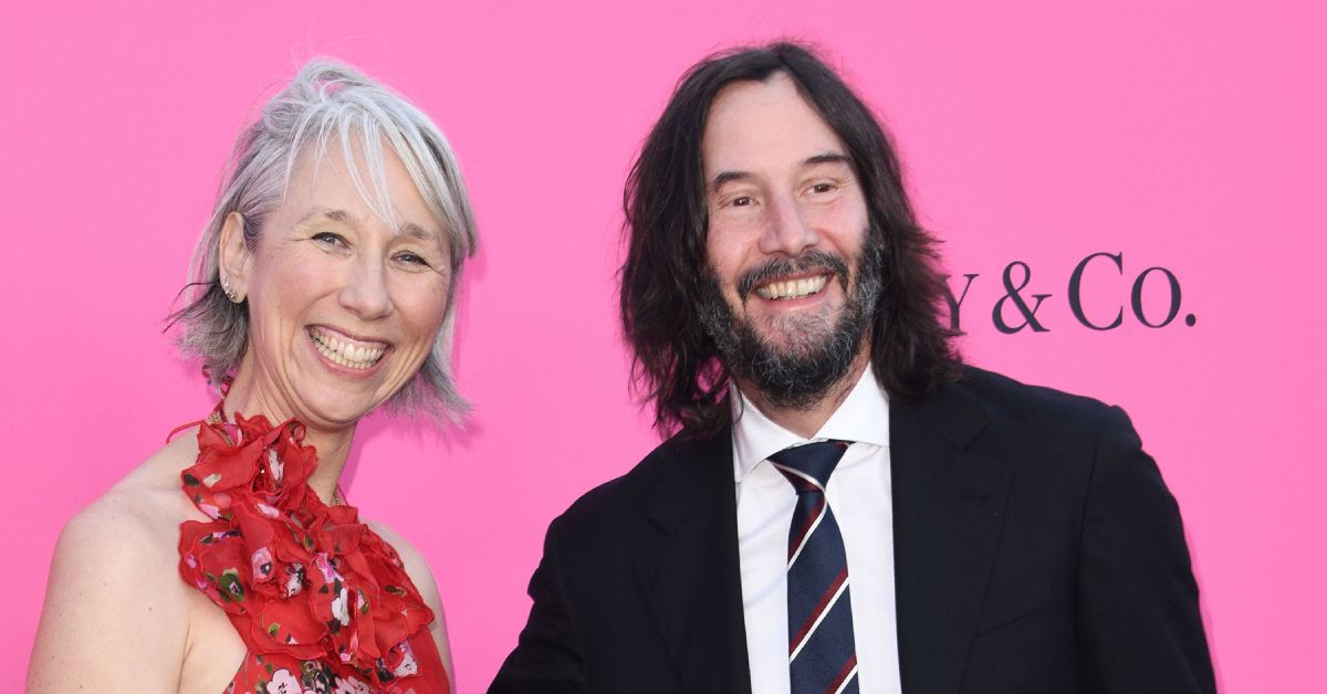 Keanu Reeves and Alexandra Grant looking extremely happy