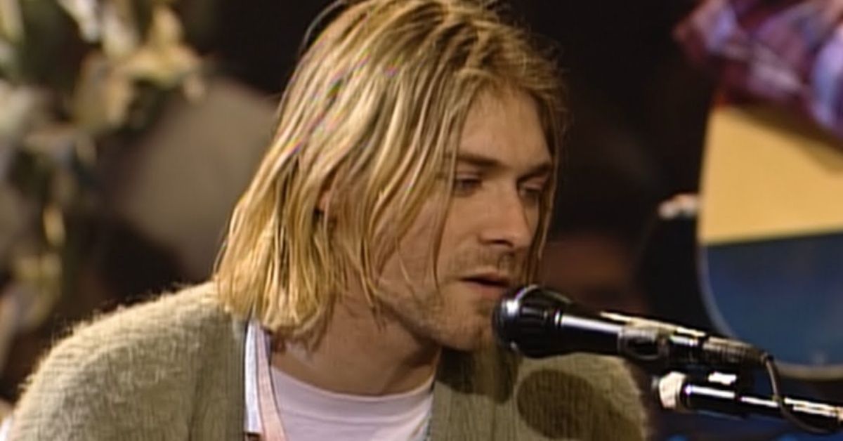 Kurt Cobain singing and playing the guitar