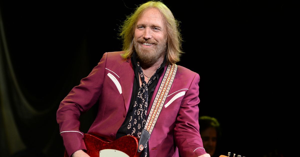 Tom Petty smiling during a concert