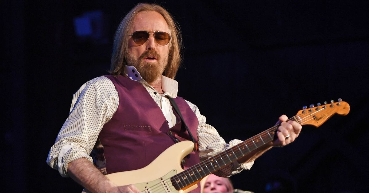 Tom Petty playing the guitar