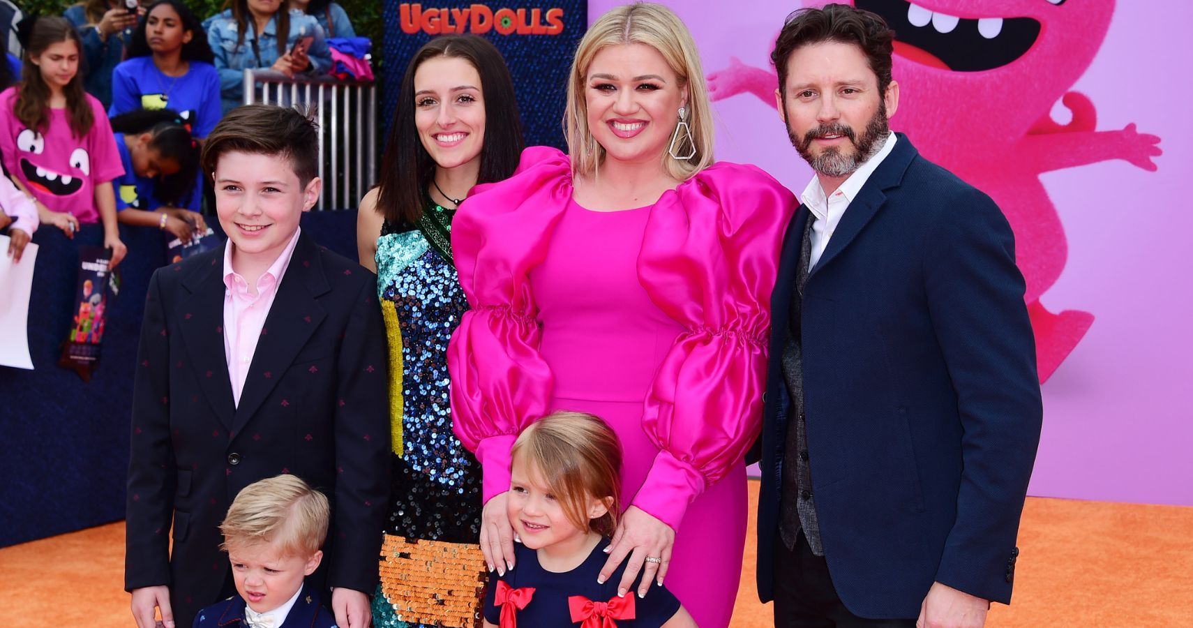 Kelly Clarkson, Brandon Blackstock, and kids on the red carpet