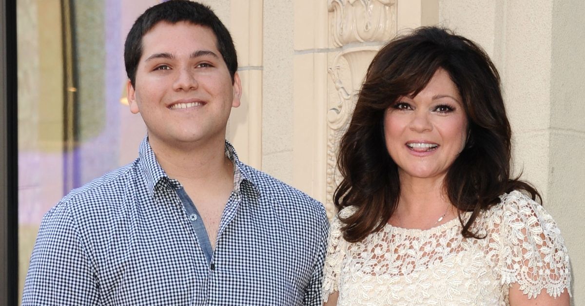 Wolfgang Van Halen and Valerie Bertinelli smiling and standing together