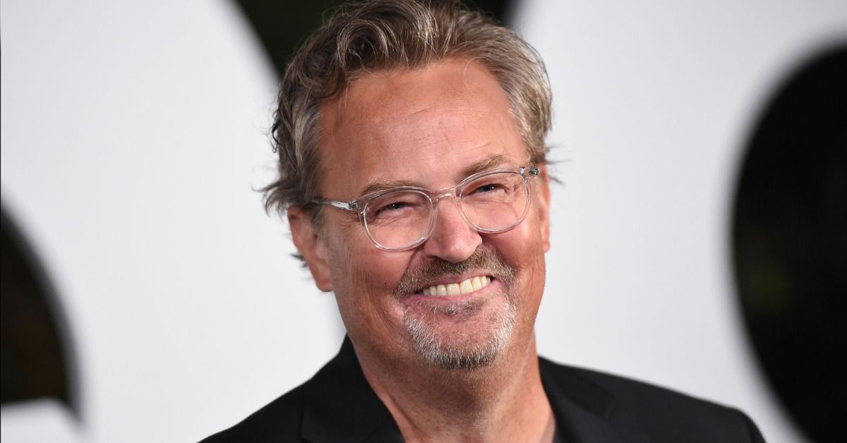 Matthew Perry smiles during a Man of the Year event before his untimely death
