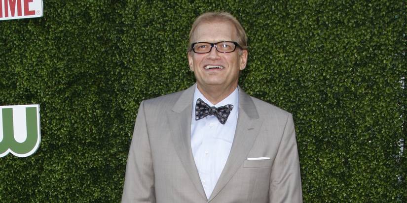 Drew Carey looking happy