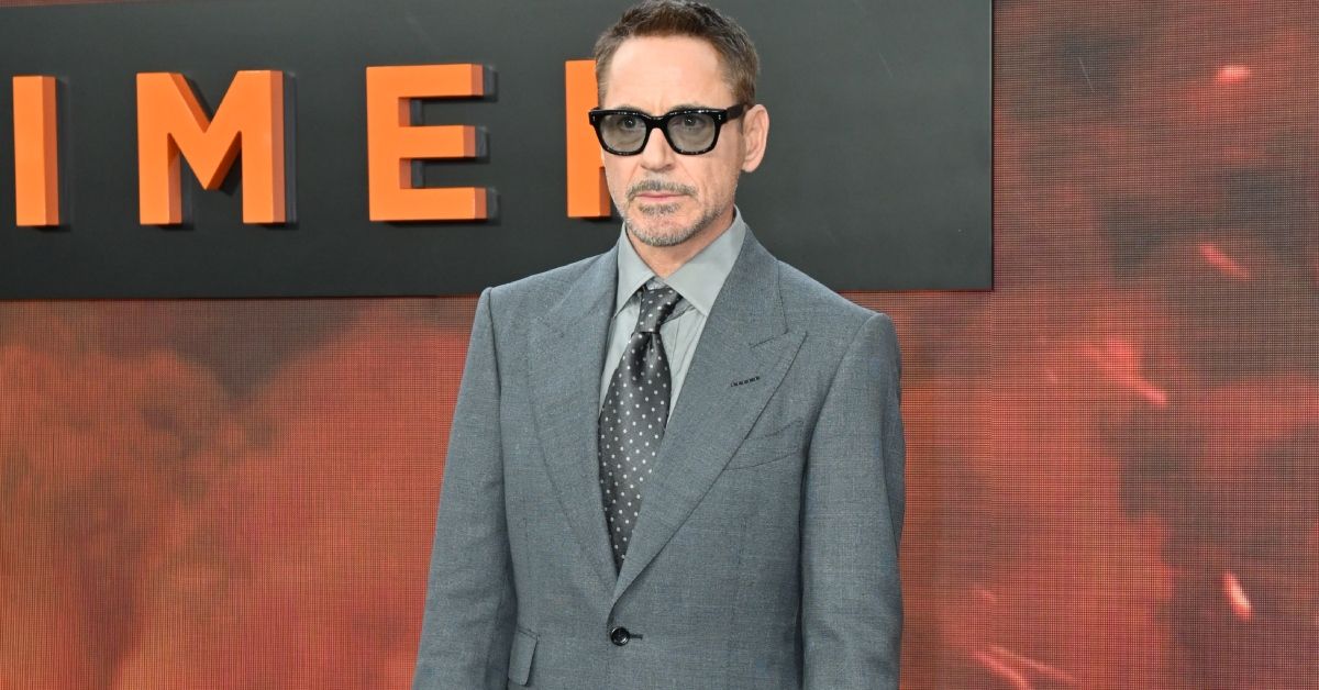 Robert Downey Jr. standing on the red carpet of a movie premiere