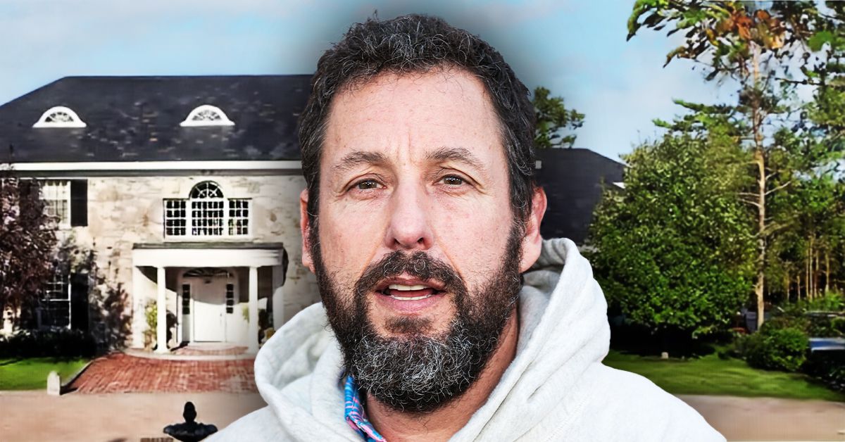 Adam Sandler in front of a house