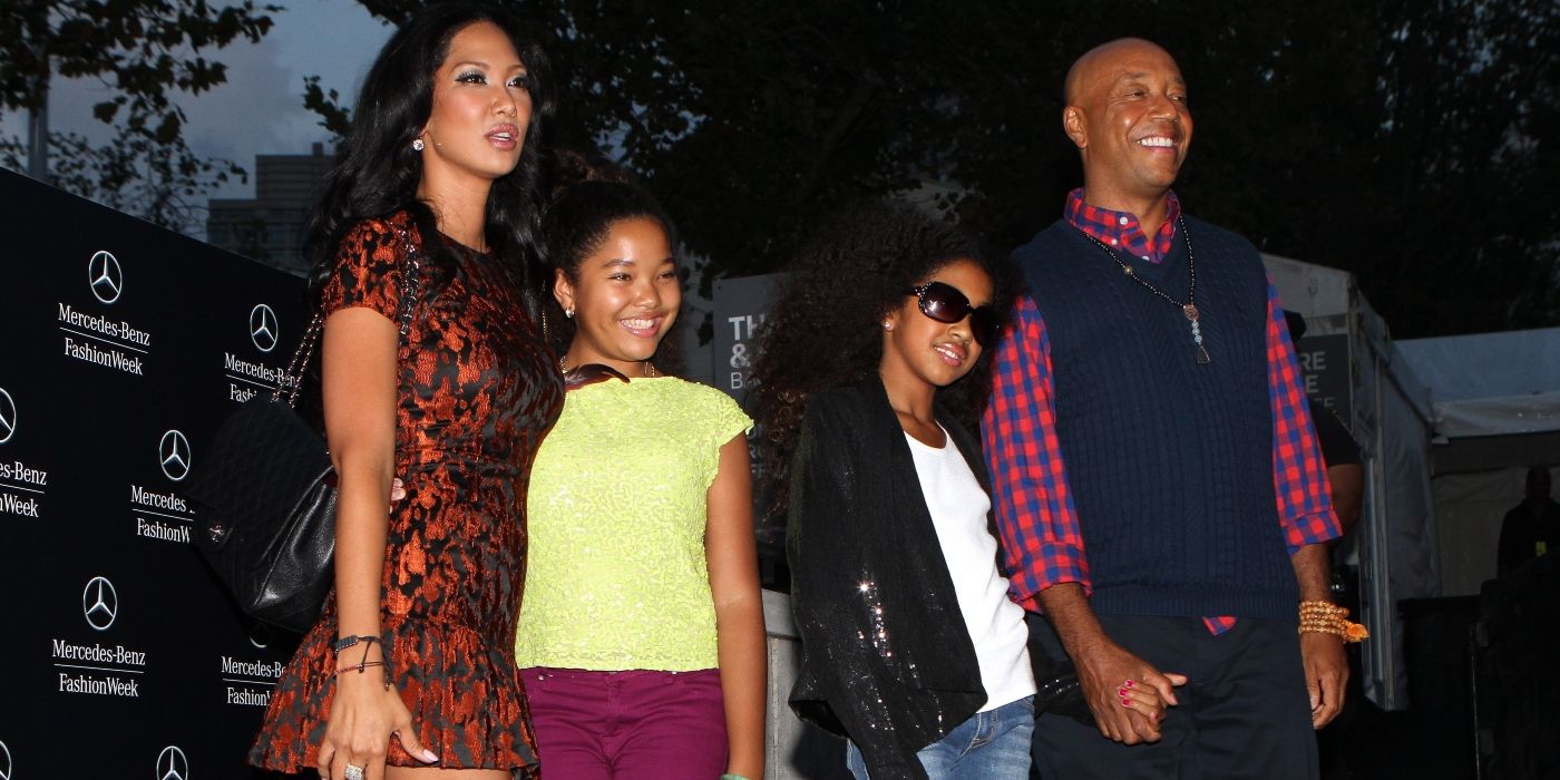 Kimora Lee Simmons, Aoki Lee Simmons, Ming Lee Simmons, and Russell Simmons on the red carpet