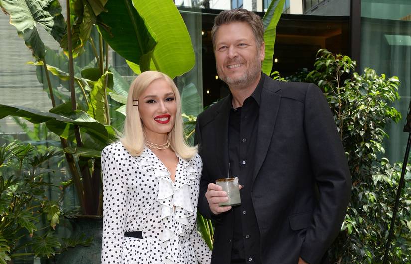 Gwen Stefani and Blake Shelton posing for a photo