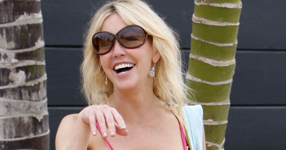 Heather Locklear smiling in a candid photo