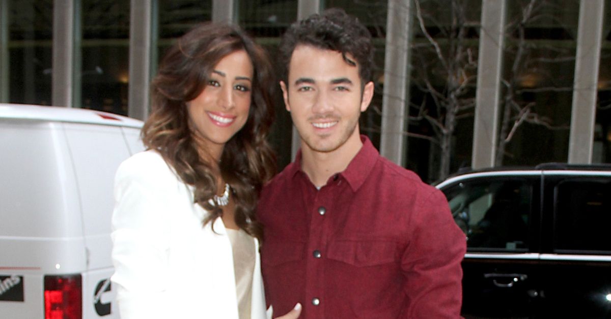 Kevin Jonas and Danielle Jonas looking happy